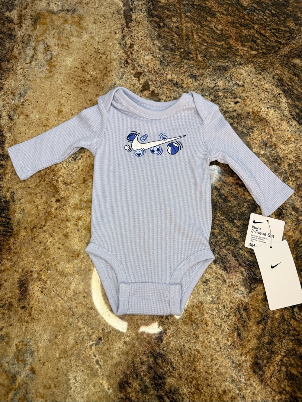 Nike Light Blue Long Sleeve Baby One-Piece with Airplane Graphic
